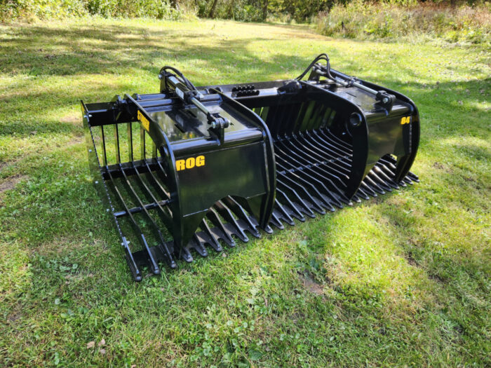 Open Sides Rock Grapple Bucket from Stinger Attachments in field