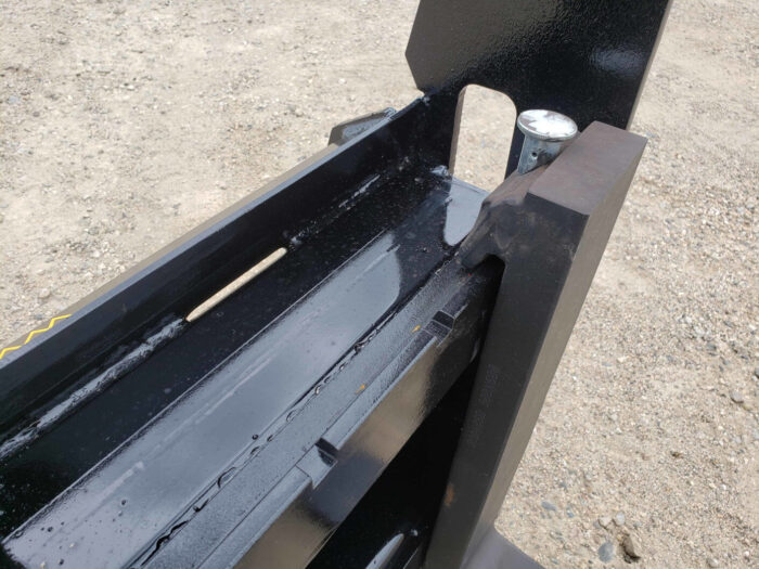 Zoom in of pallet fork attachment part