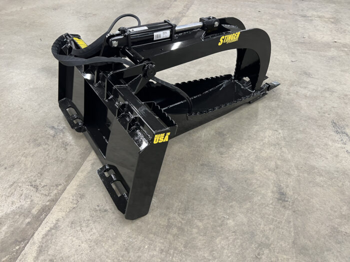 Angle view of Tractor Stump Grapple from Stinger Attachments